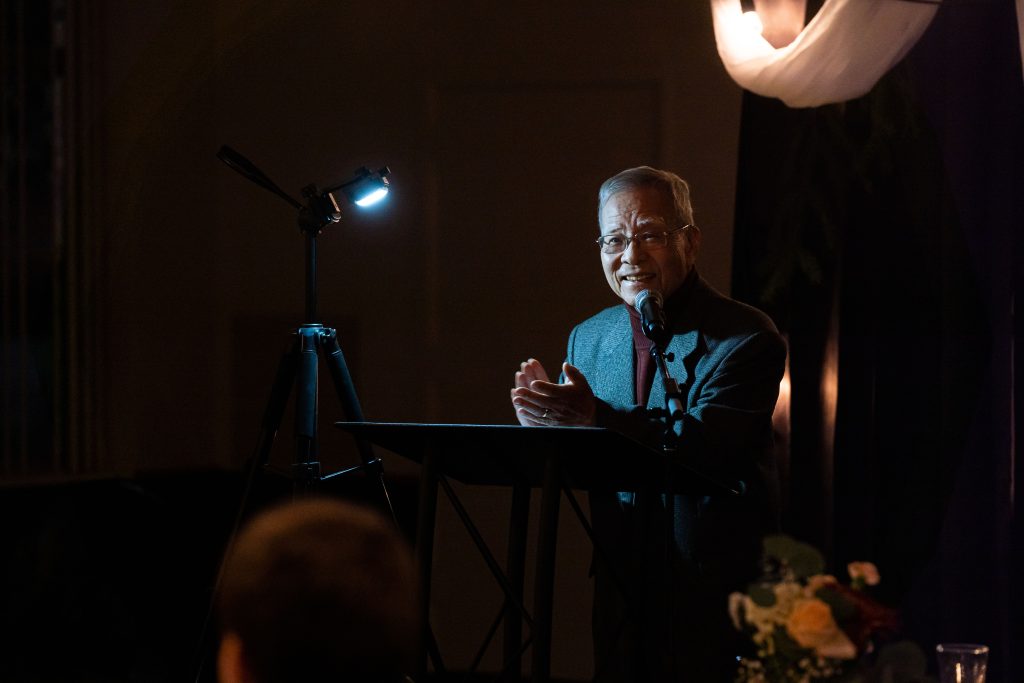 Song Nah Rhee addresses attendees during a presentation at Bushnell University.
