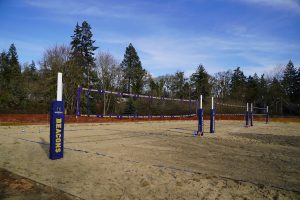 Grace Community Fellowship Beach Volleyball Courts at Bushnell University with three sand courts ready for competition.