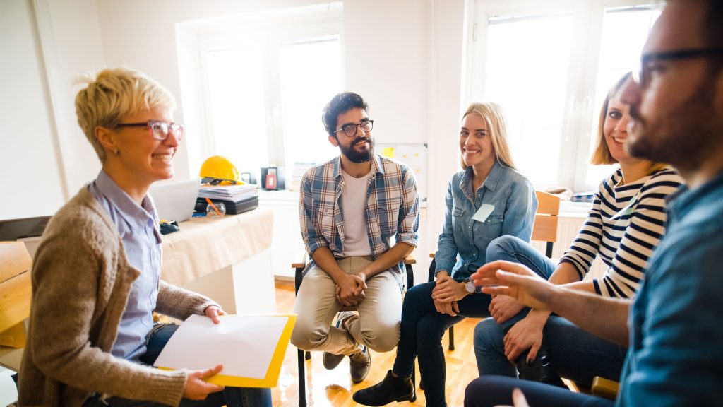 Students participating in a small group discussion during a counseling session.